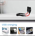 Black and red earbuds with USB cable, labeled 'USB charging', on a light gray background.
