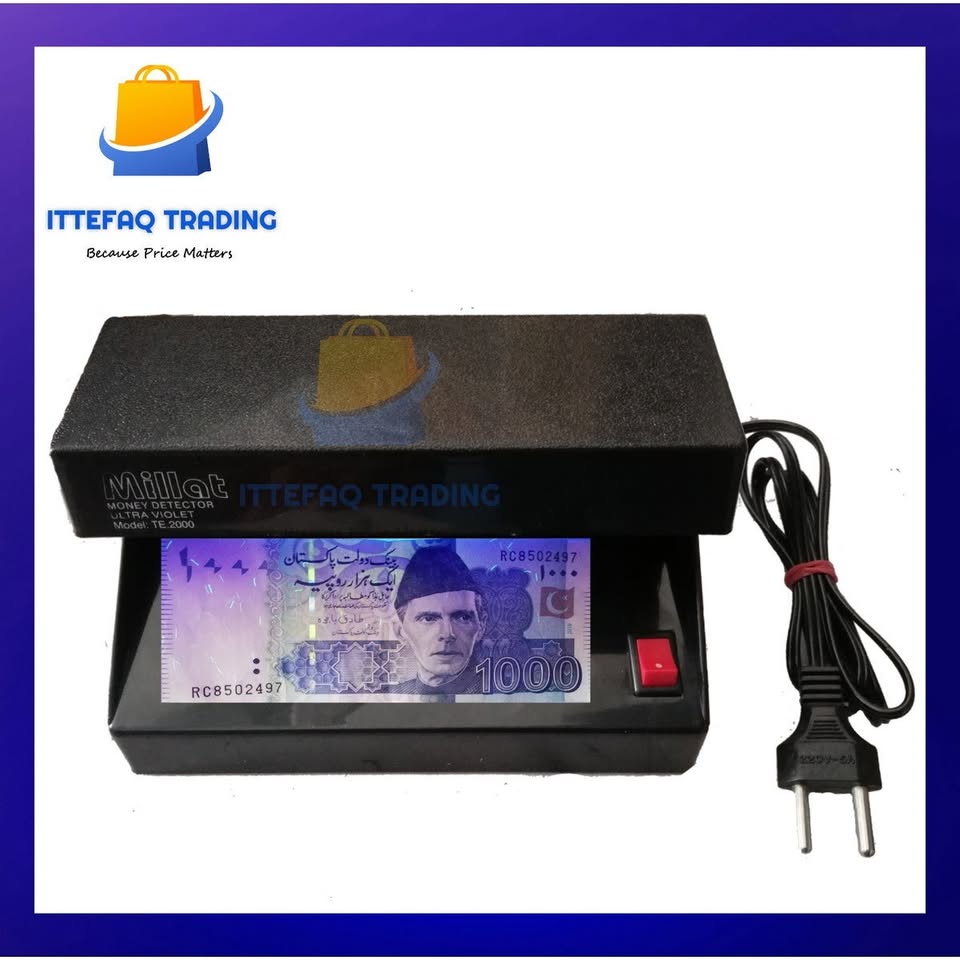 Black UV money detector with a Pakistani currency note on a white background, featuring Ittefaq Trading logo.